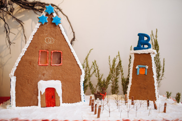 BRYTER Estates: Our gingerbread house depicts a quaint Sonoma cottage near our Pinot Noir vineyards. The two linked wedding rings on the front symbolize the marriage of our owners, Bryan and Terin, hence BRYTER. 